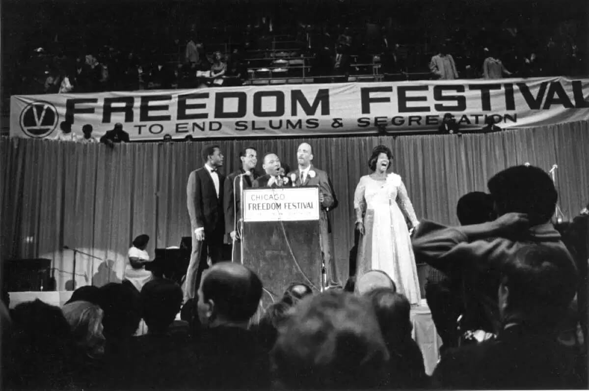 Martin Luther King Jr. speaking at a festival during the Chicago Freedom Movement by Bob Fitch.