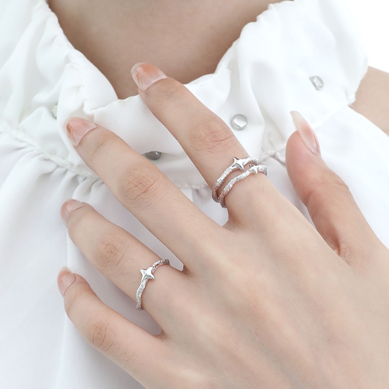 Starla N°6 and N°7 rings styled with other Starla rings, 925 sterling silver stackable star ring set on hand