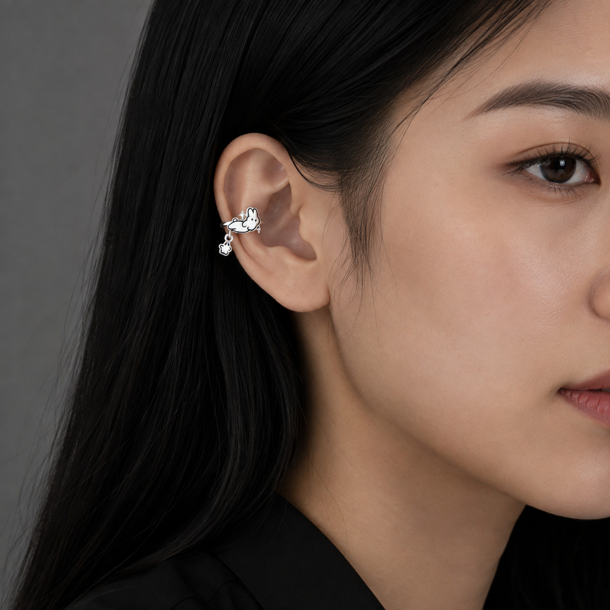 Woman wearing Bunny Ear Cuff with a black top