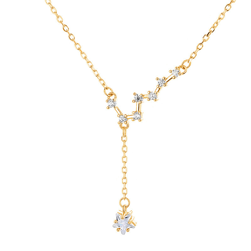 Dara N°2 18K gold star necklace with celestial pendant