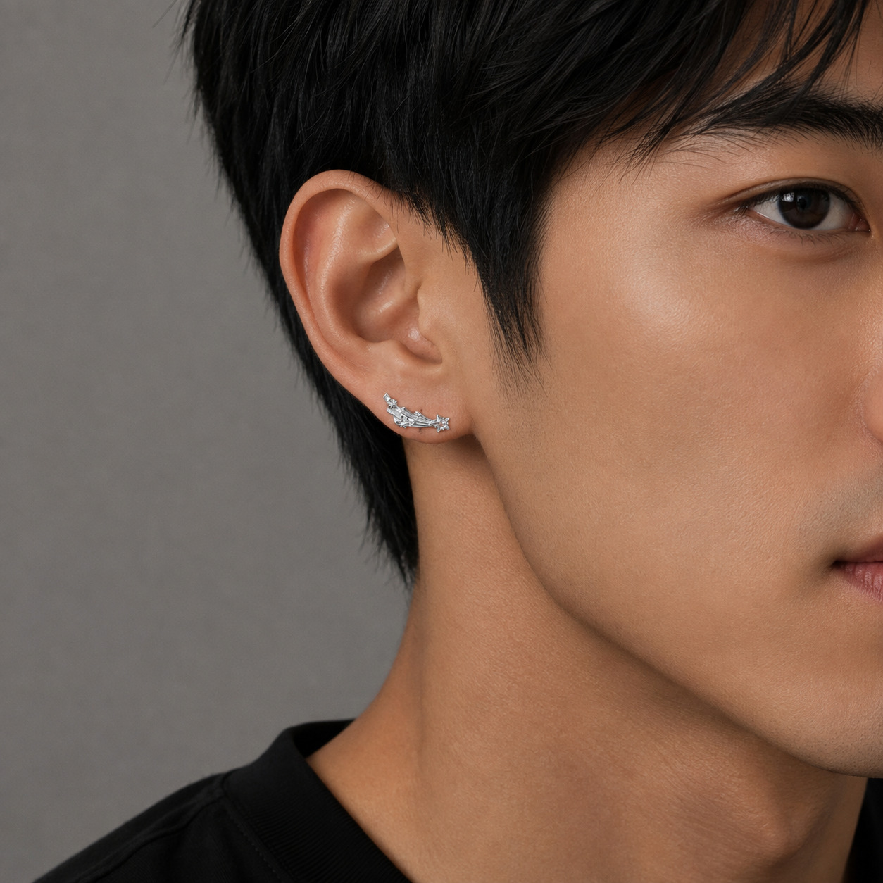 Dara N°5 Ear Studs wearing on a male model's ear