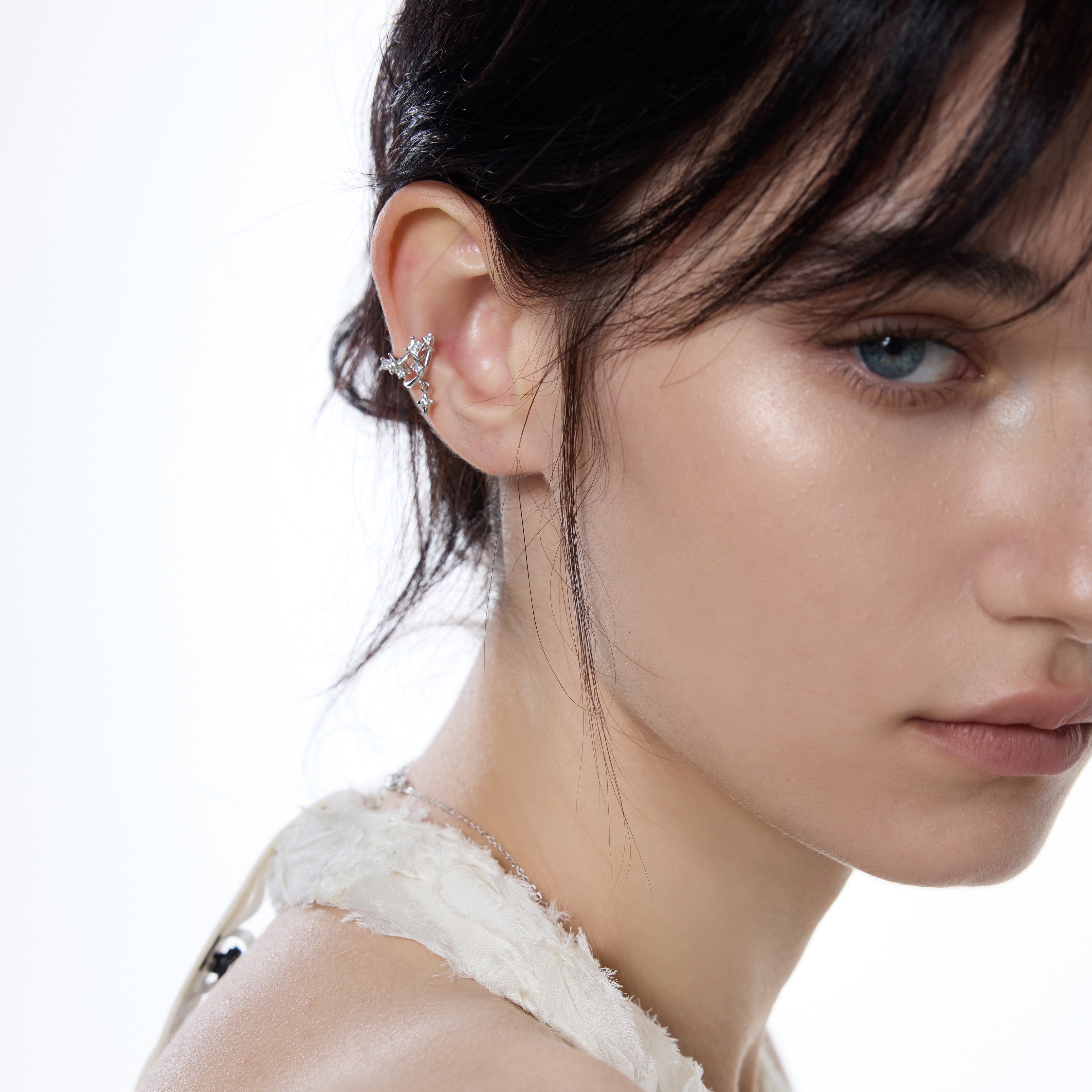 Handemade dainty sterling silver star ear cuff by Jentle Jewelry