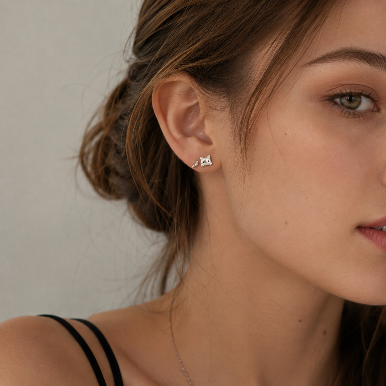 Kitty N°2 Ear Studs wearing on a female model's ear