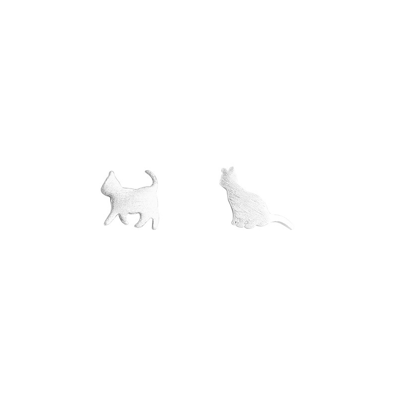 Kitty N°3 Ear Studs — sterling silver mismatched cat stud earrings