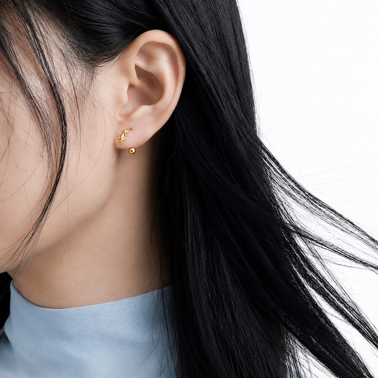 Moana N°2 Ear Studs Gold styled on ear, side profile