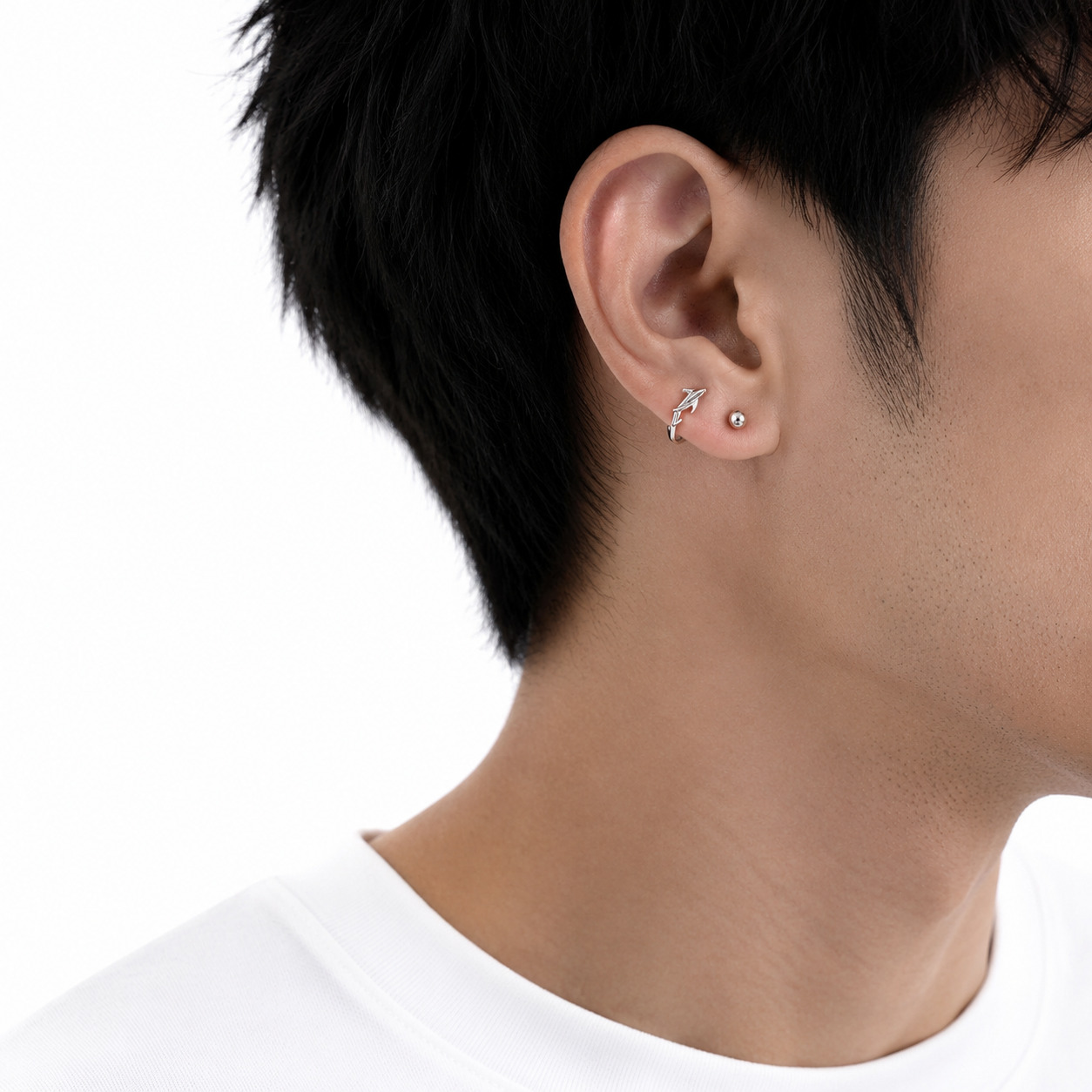 Moana N°2 Ear Studs on a male model, Pisces-inspired jewelr