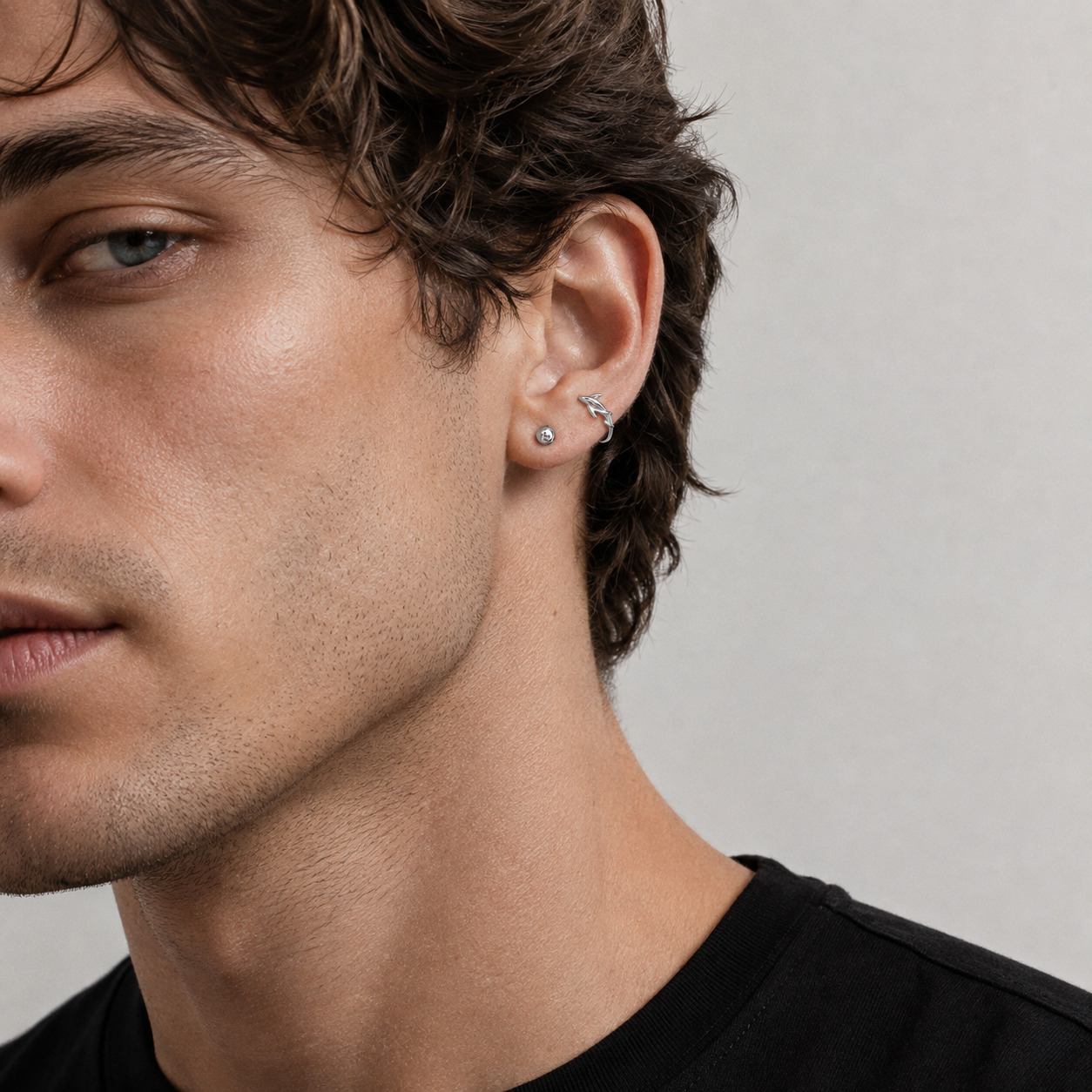 Moana N°2 Ear Studs on an White male model, Pisces-inspired jewelry