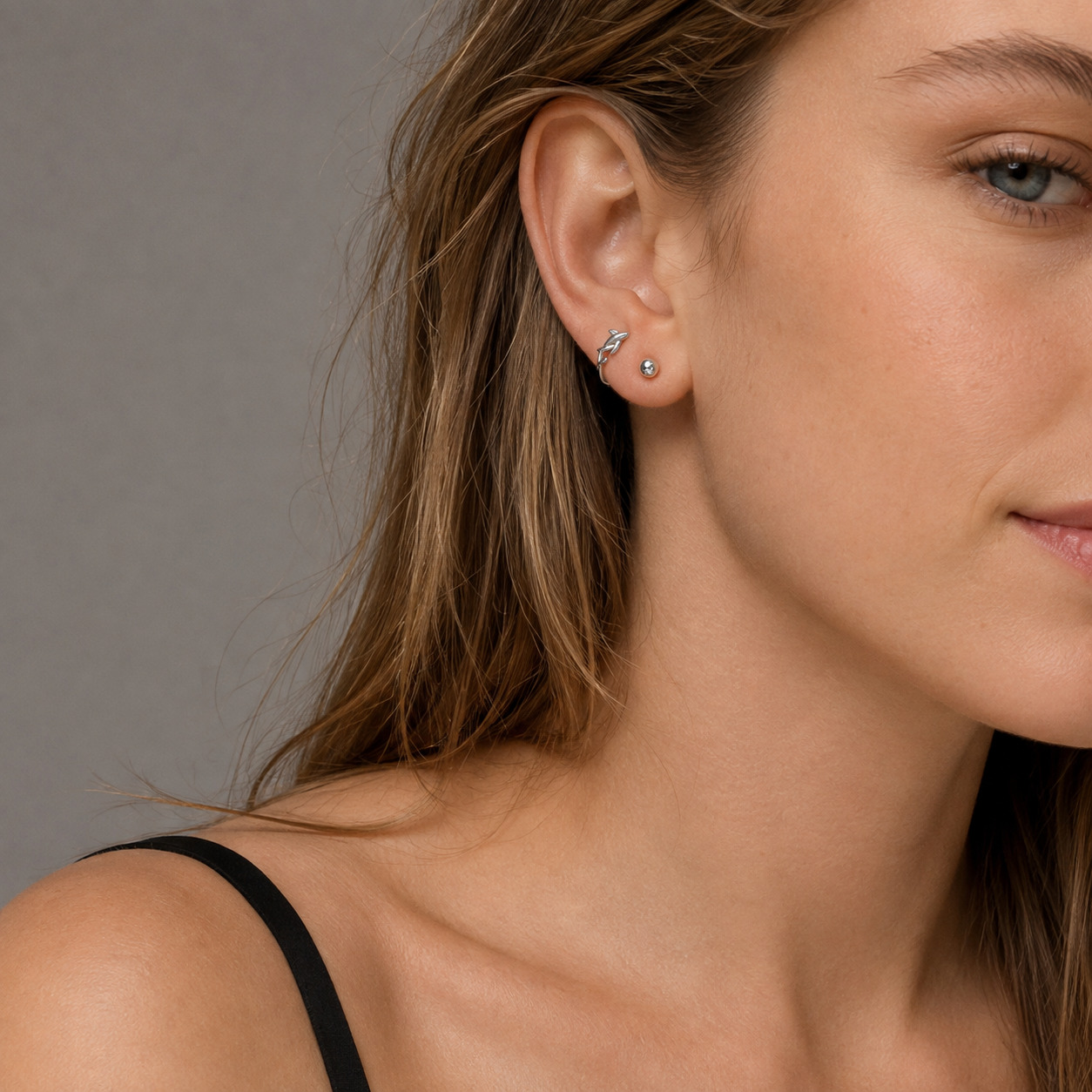 Moana N°2 Ear Studs on an white female model, Pisces-inspired jewelry