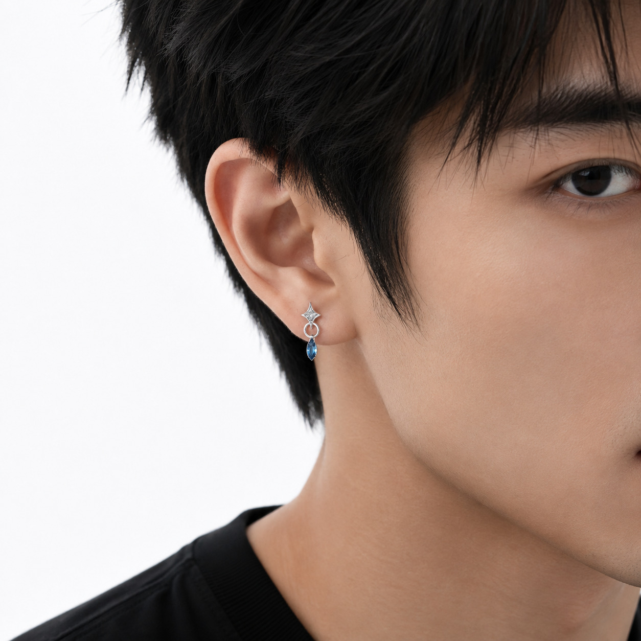 Starla N°7 sterling silver earrings on man's ear