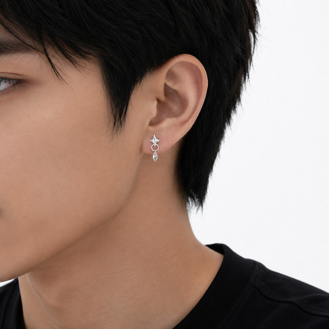 Starla N°7 silver star earrings worn by man