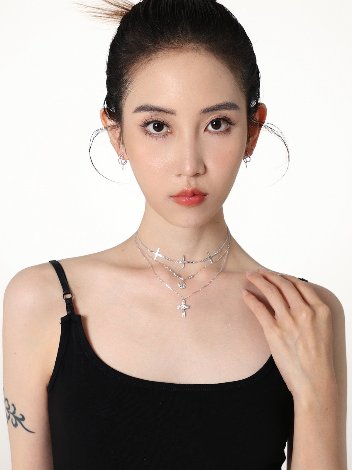 Dainty sterling silver triple layered cross shell and floral cross necklaces by Jentle Jewelry