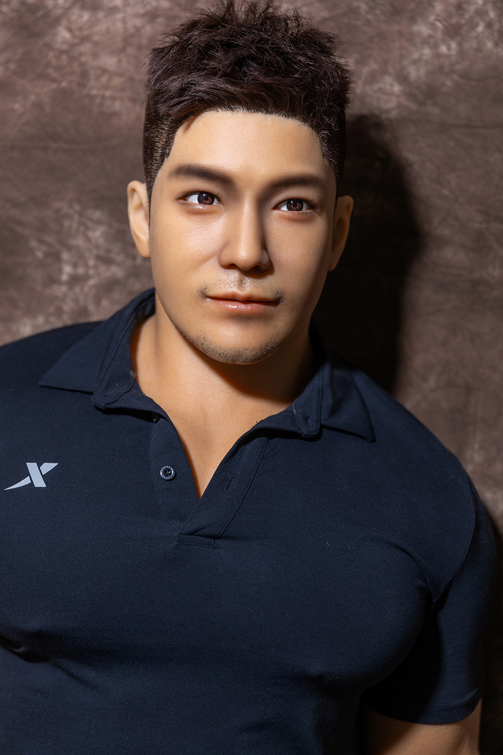 Realistic male sex doll face, black polo shirt