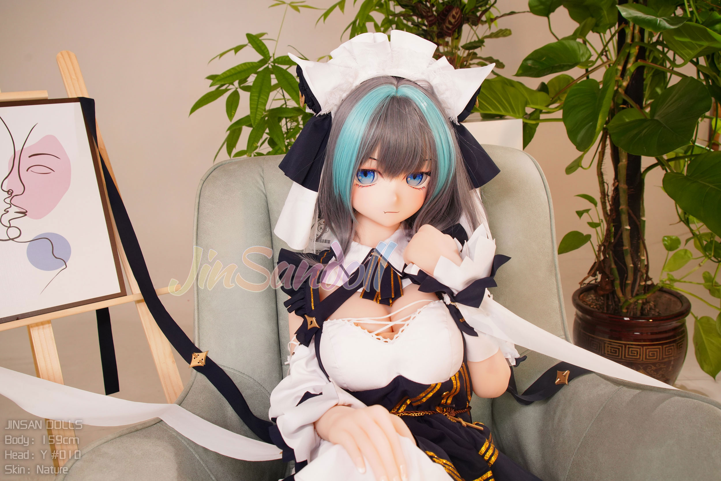 Anime sex doll with blue highlights in maid outfit, Jinsan Dolls.