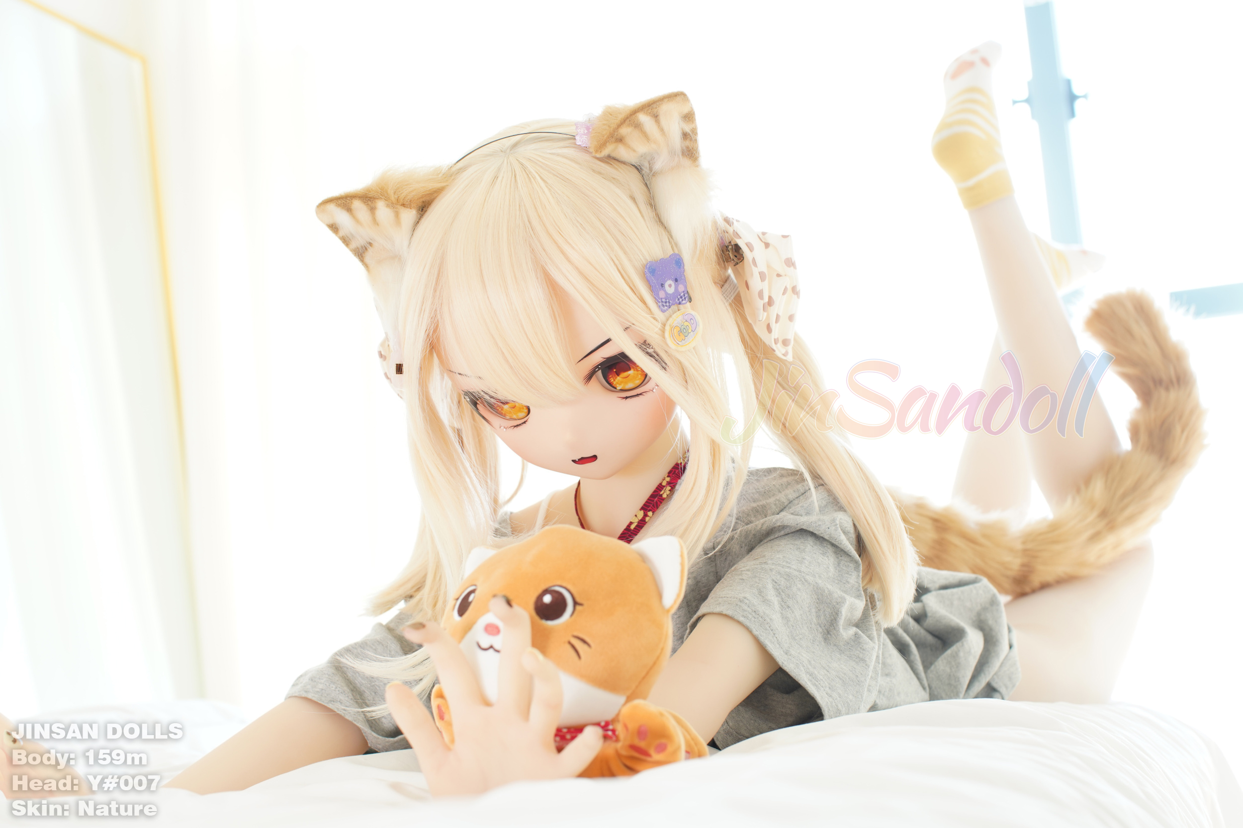 Anime sex doll Ayano, cat ears and a plush toy