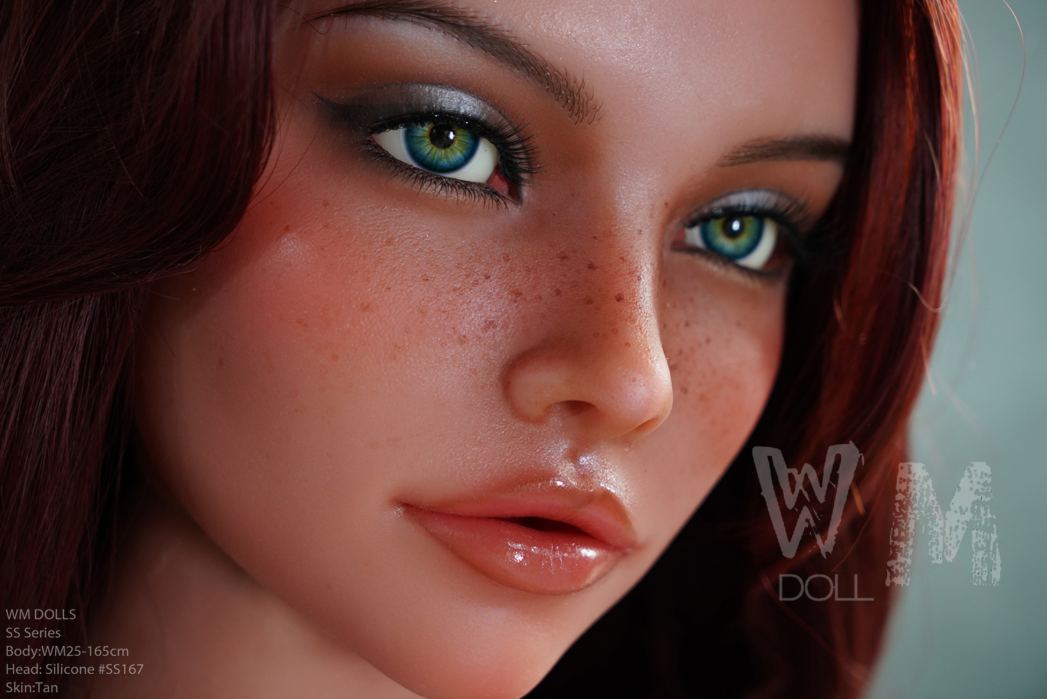 Close-up of Mandy sex doll face, green eyes, freckles and red hair