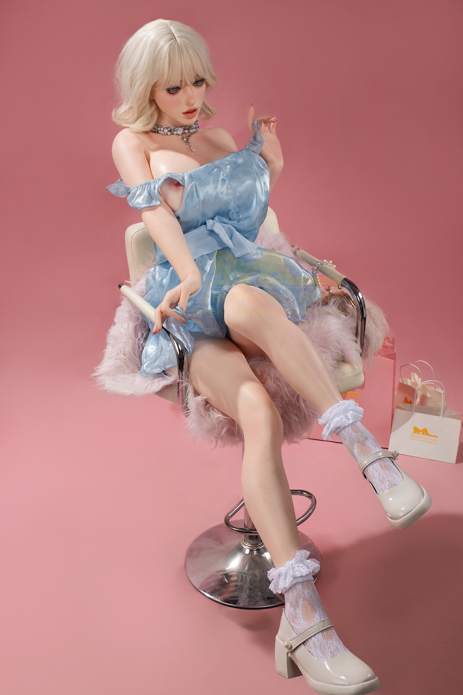 Bailey sex doll in blue dress, seated with shopping bags