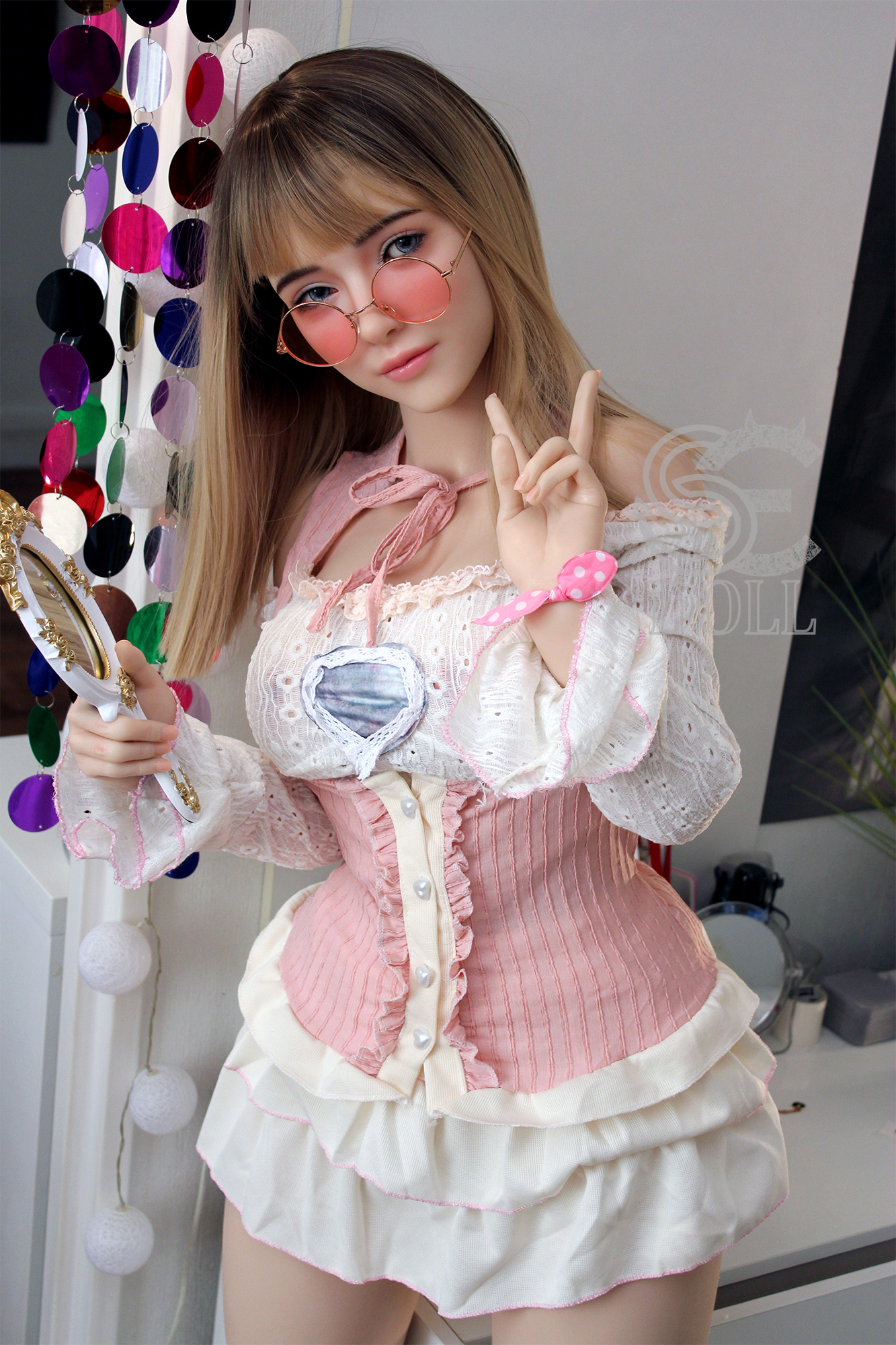 Annika.G doll posing, wearing pink outfit and glasses