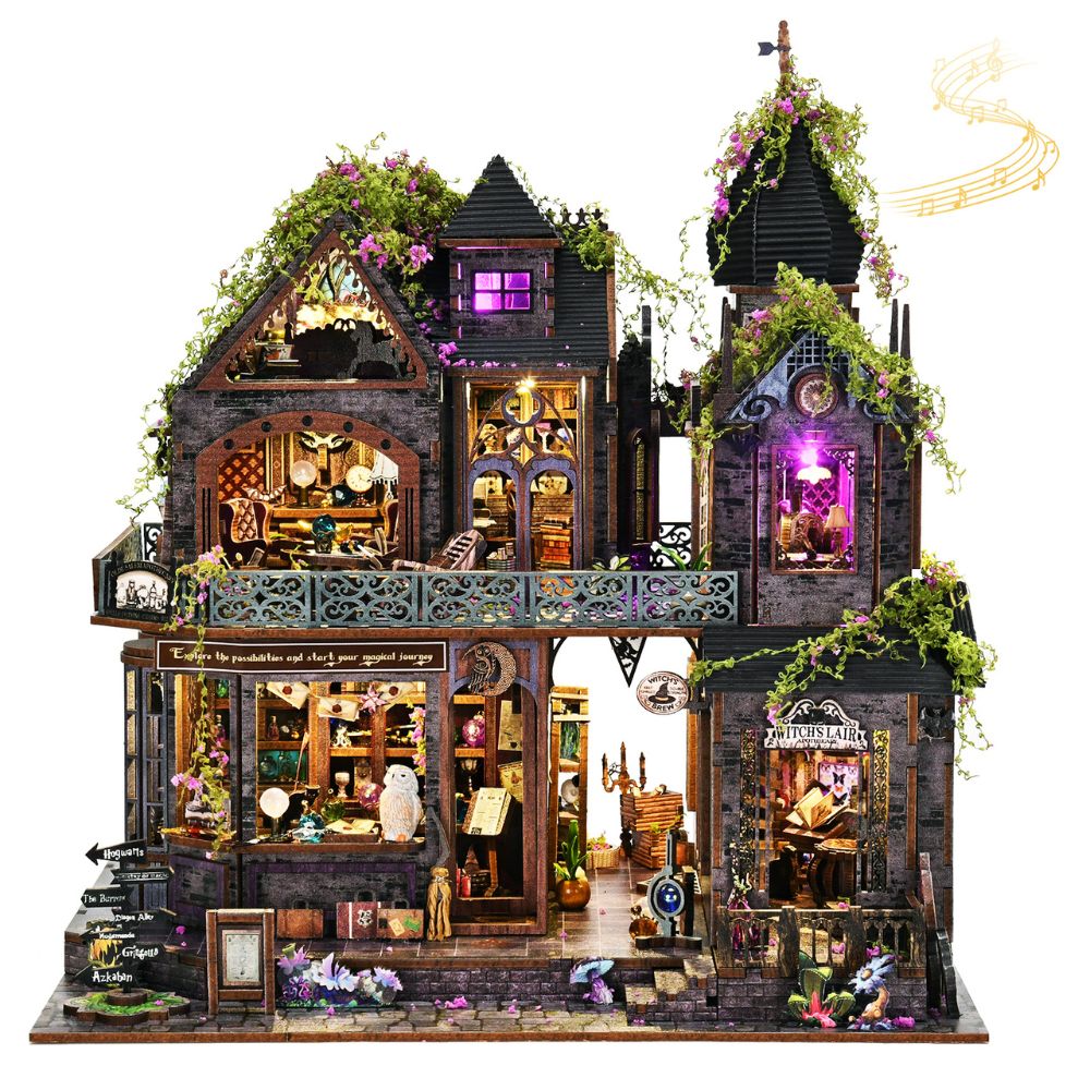 Witch's Lair Magic Shop DIY book nook kit featuring wizard castle miniature with LED lighting, potions, spellbooks and owl figure