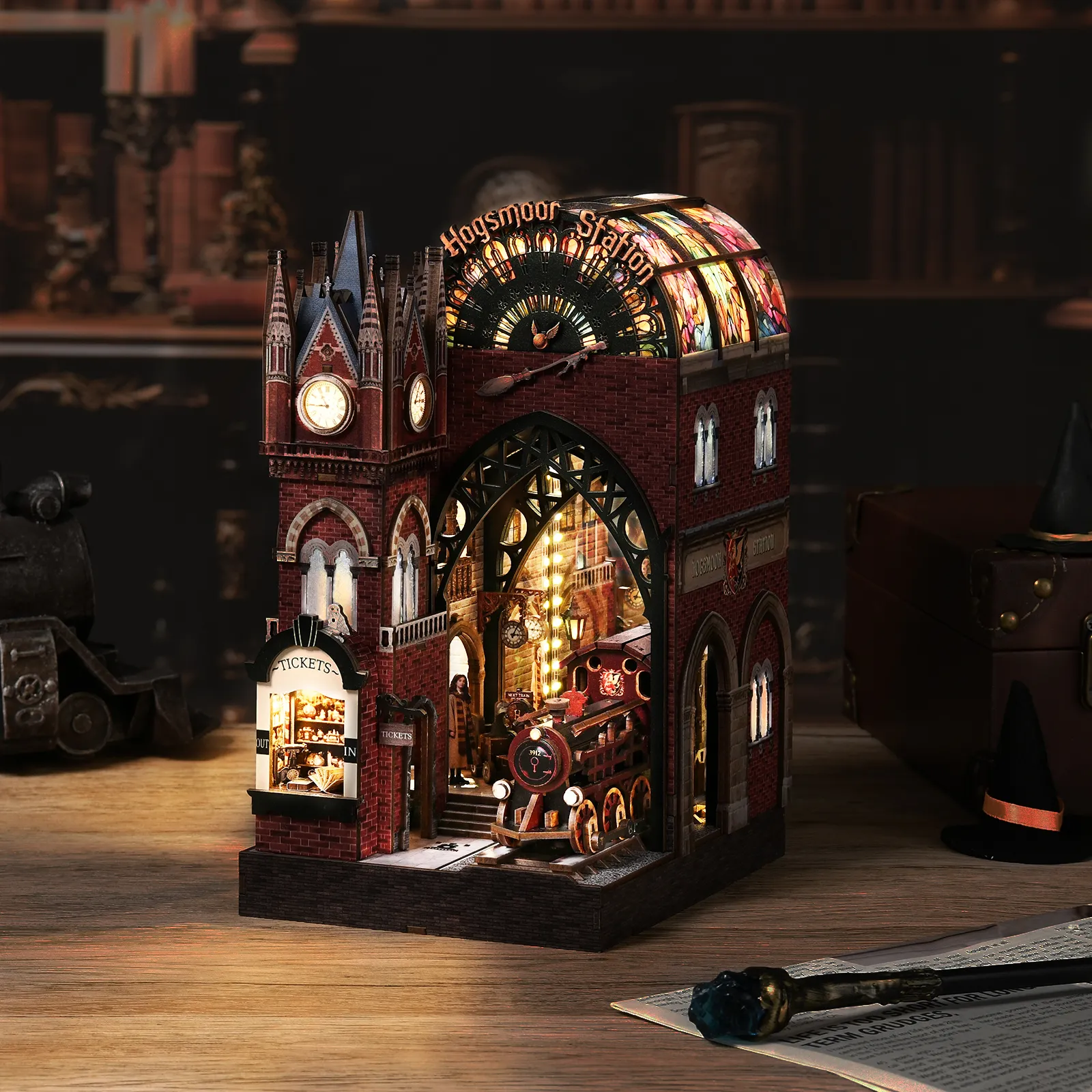 DIY book nook kits for adults displayed on a bookshelf