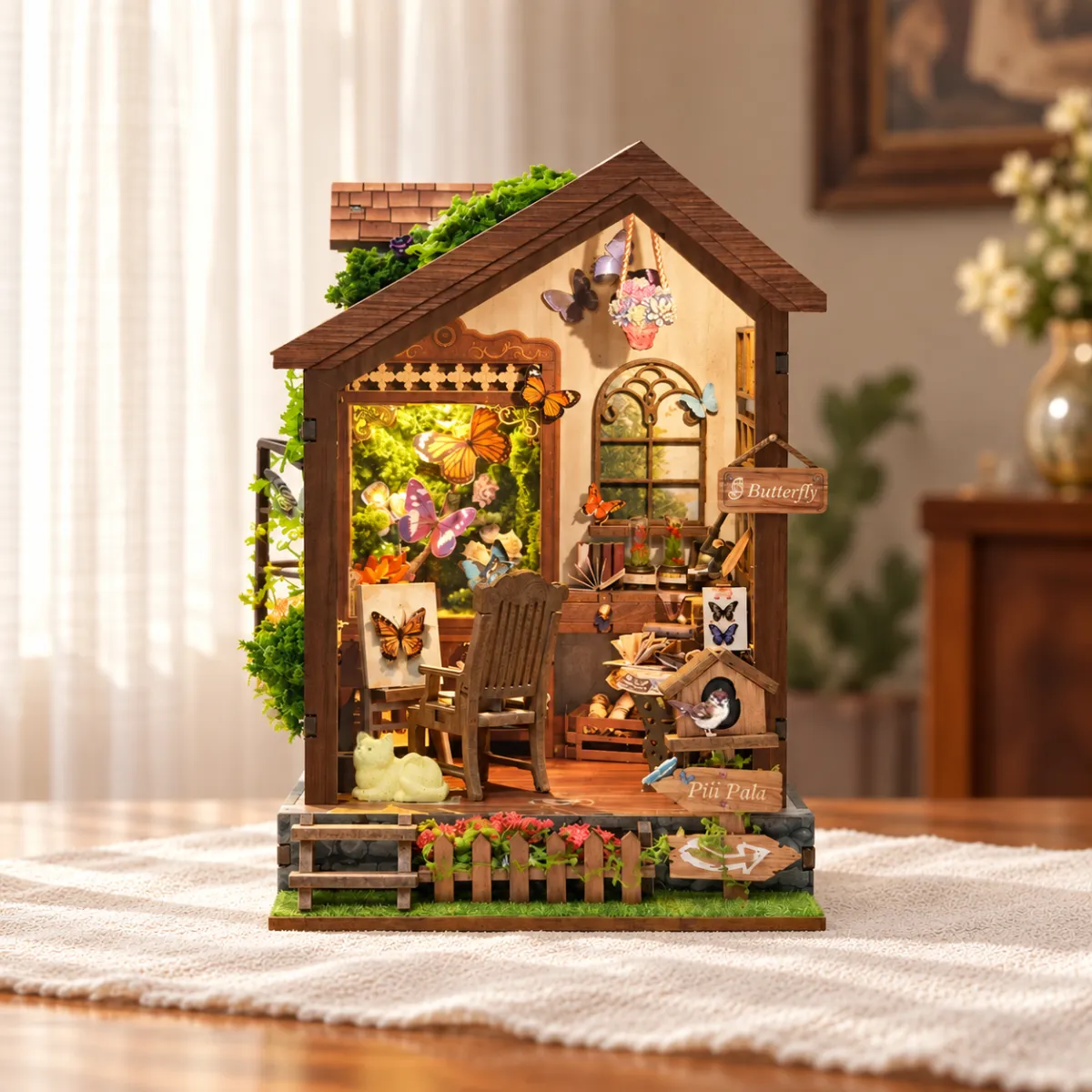 Butterfly House DIY Book Nook Kit with lights on