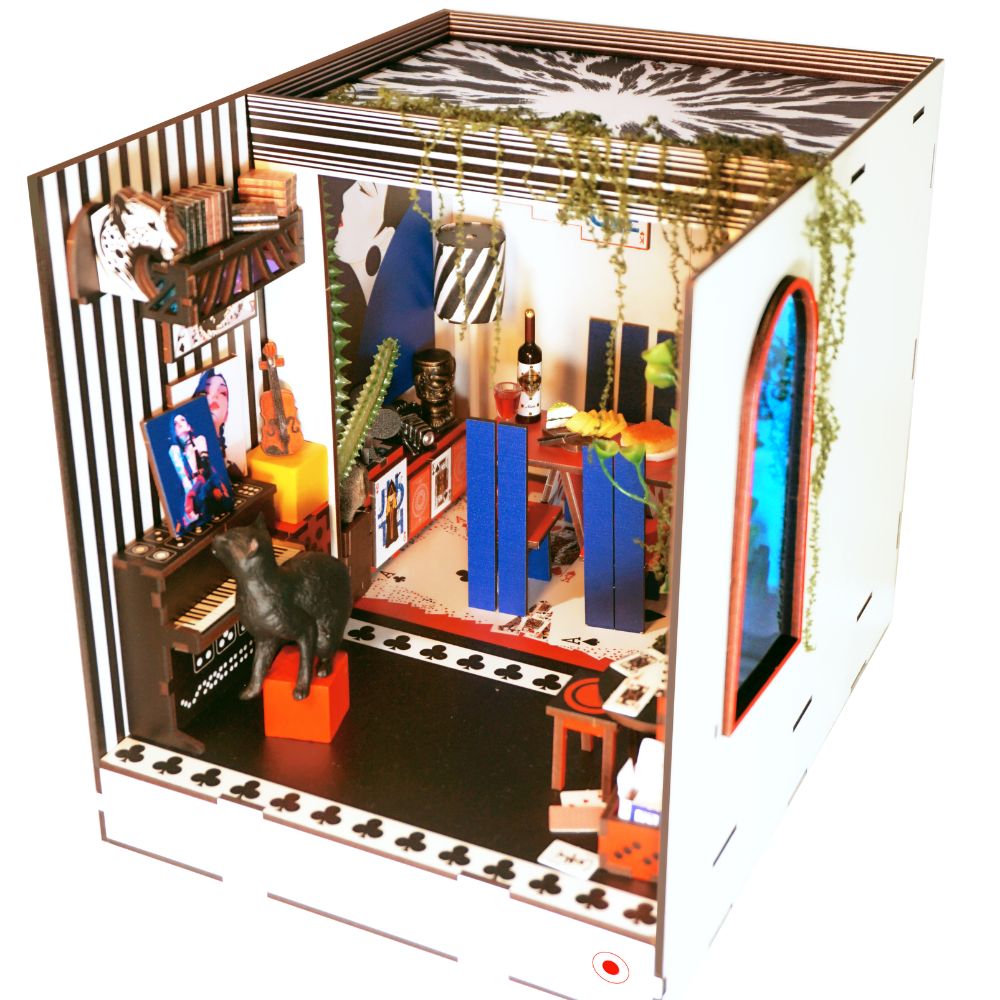 Book nooks are also known as bookshelf inserts and often depict scenes from famous books or other themed settings, such as cozy cottages, bustling alleys, or fantasy landscapes.