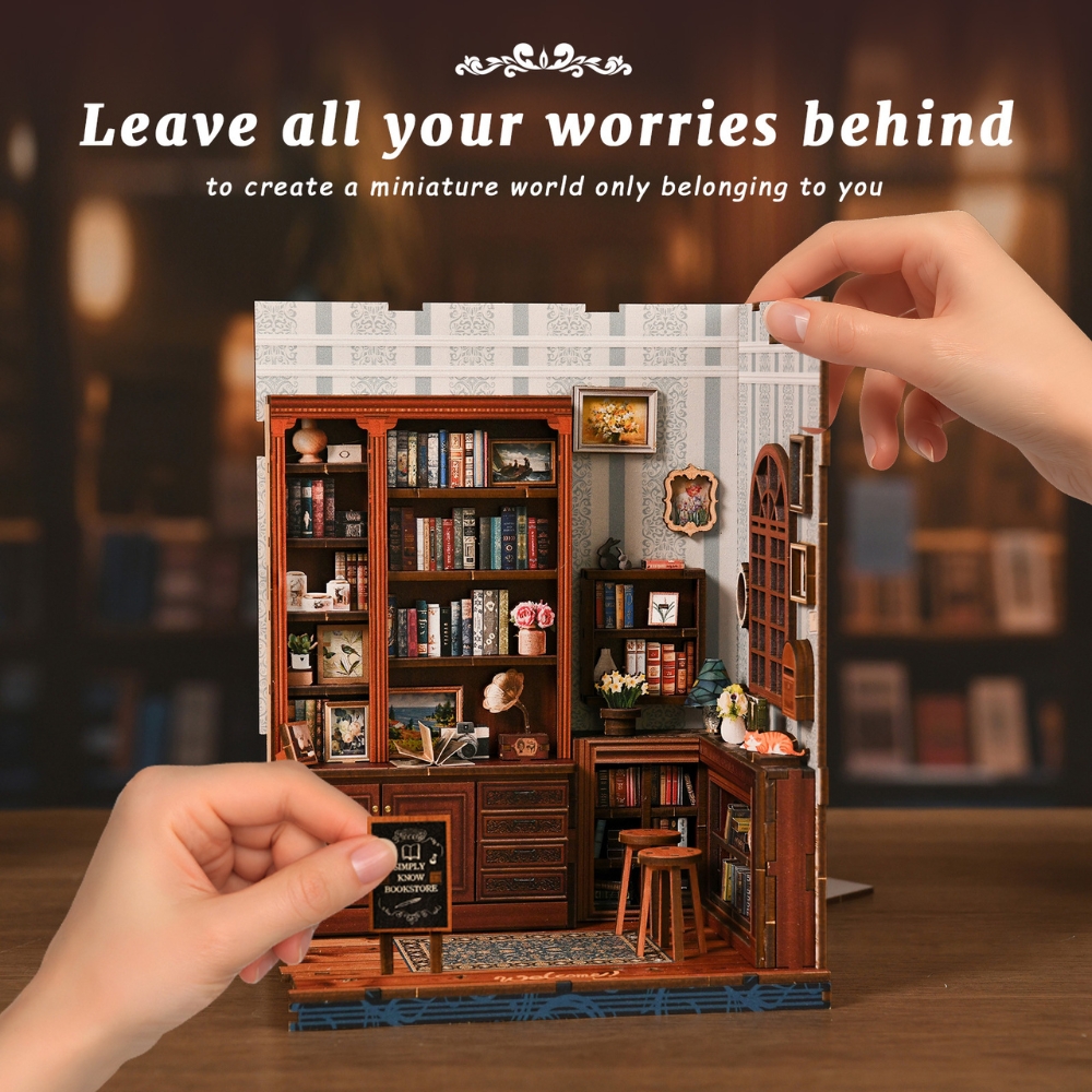 The product shown is a miniature study room scene with a bookshelf, desk, and chair.