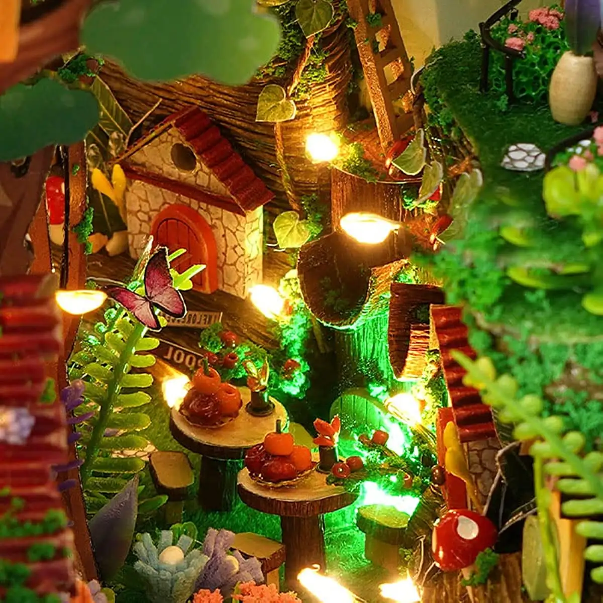 Firefly Forest DIY Book Nook Kit with miniature trees, fairy lights, and woodland creatures for creating a magical bookshe...