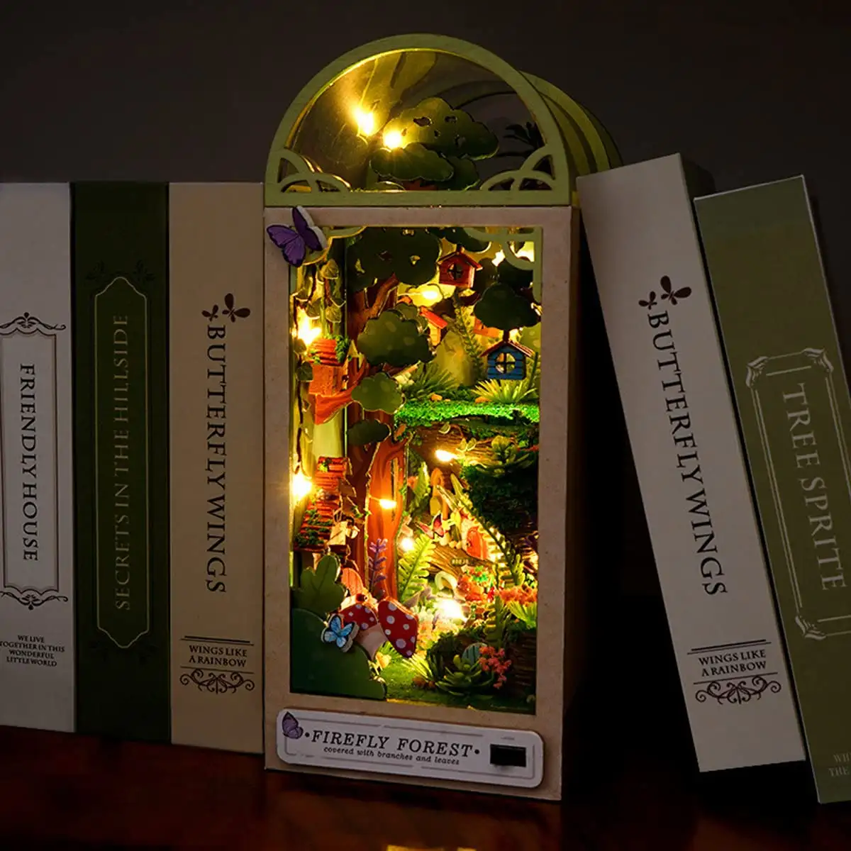 Firefly Forest DIY Book Nook Kit with miniature forest scene, fairy lights, and detailed bookends for cozy reading nooks.