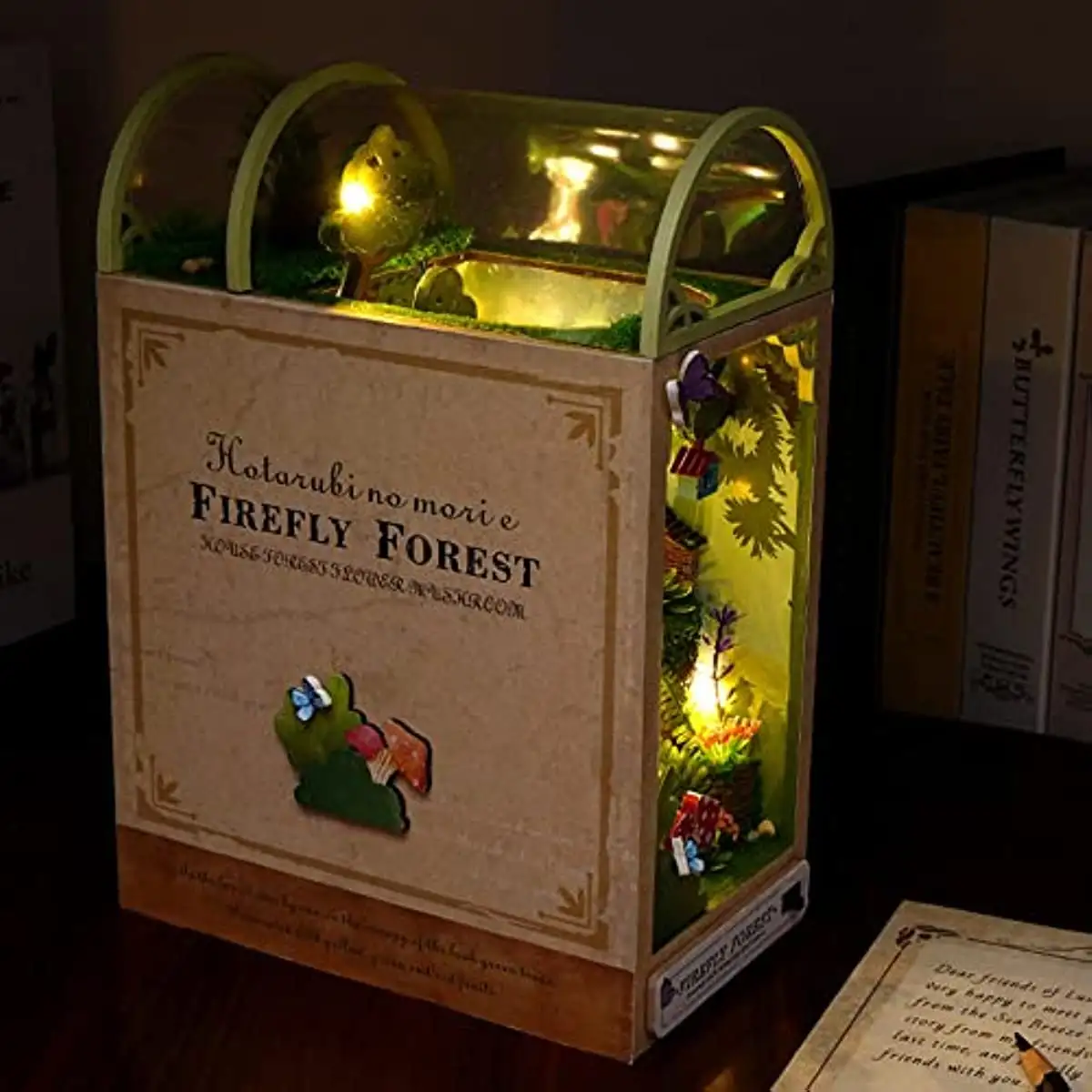 DIY Firefly Forest Book Nook Kit with miniature trees, lights, and detailed scenery for enchanting bookshelf decor.
