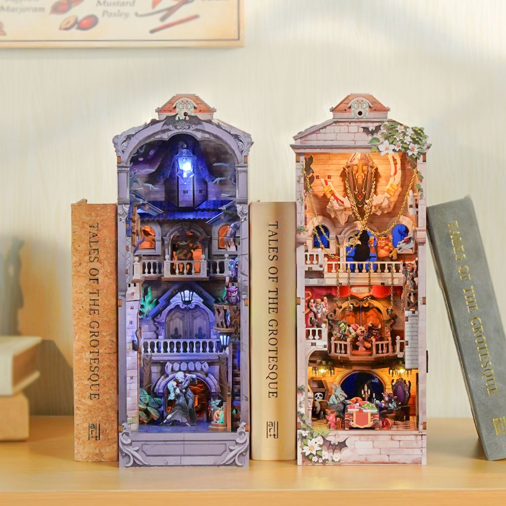 The Monster Carnival DIY Book Nook Kit, which is a double-sided miniature castle designed as a bookshelf insert.