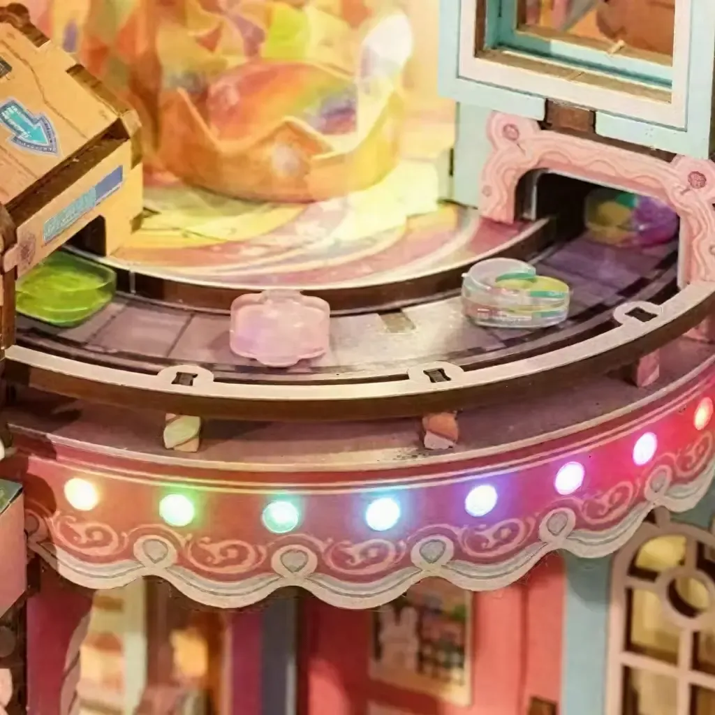 Storytelling Orbit Candy Platform with Festive String Lights