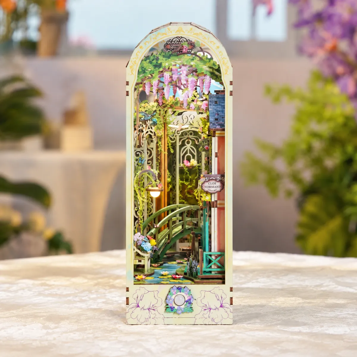 Giverny Garden DIY Book Nook Kit with lights on