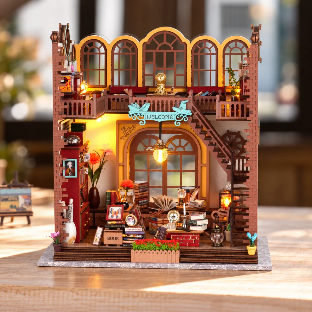 Magic Book House II DIY Book Nook Kit with lights on