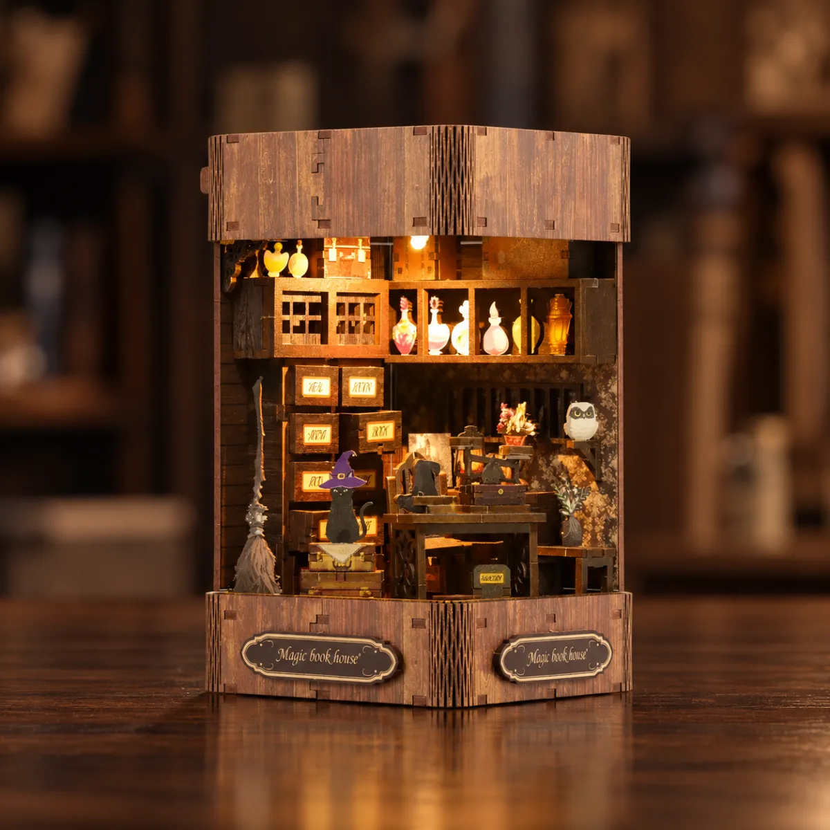 Magic Book House DIY Book Nook Kit with lights on