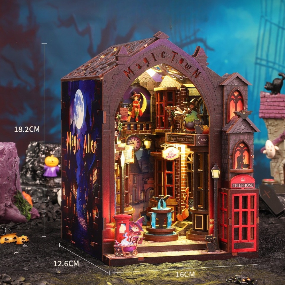 This particular model features a magical street scene with shops, a telephone booth, and streetlights. The dimensions of the assembled product are approximately 18.2 cm high, 12.6 cm deep, and 16 cm wide.
