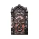 It features a detailed dragon sculpture on a faux wooden door, set within a stone-like archway.