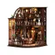 The model features a detailed interior with a spiral staircase, furniture, and various miniature accessories.