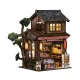 It is a 3D wooden puzzle kit that requires assembly.
The kit includes LED lighting and has an openable door.