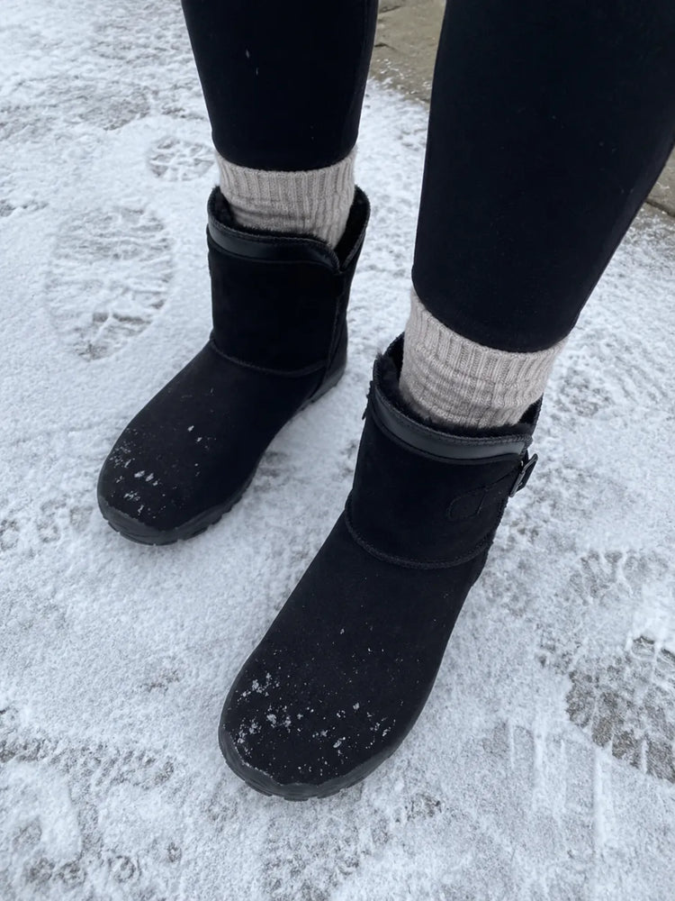 happy customer showing our shoes
