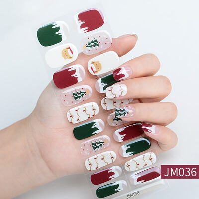Christmas nail wraps featuring festive designs with Santa Claus, Christmas trees, and red, green, and white holiday colors.