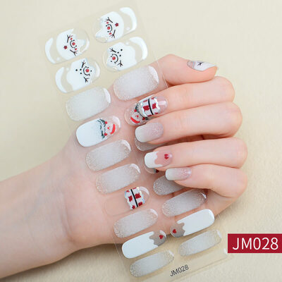 Christmas nail wraps featuring festive designs with Santa Claus, Christmas trees, and red, green, and white holiday colors.