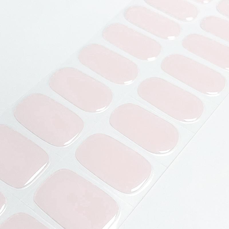 Blush Charm Gel Nail Wraps featuring a pink nude design for an elegant manicure.