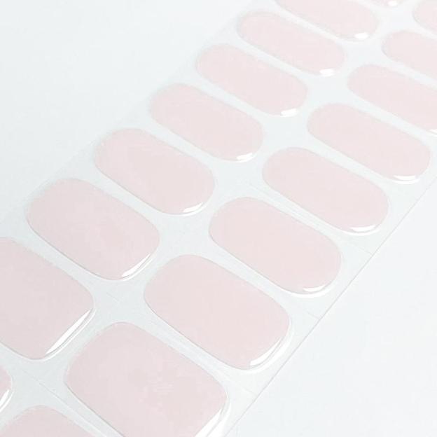Blush Charm Gel Nail Wraps featuring a pink nude design for an elegant manicure.