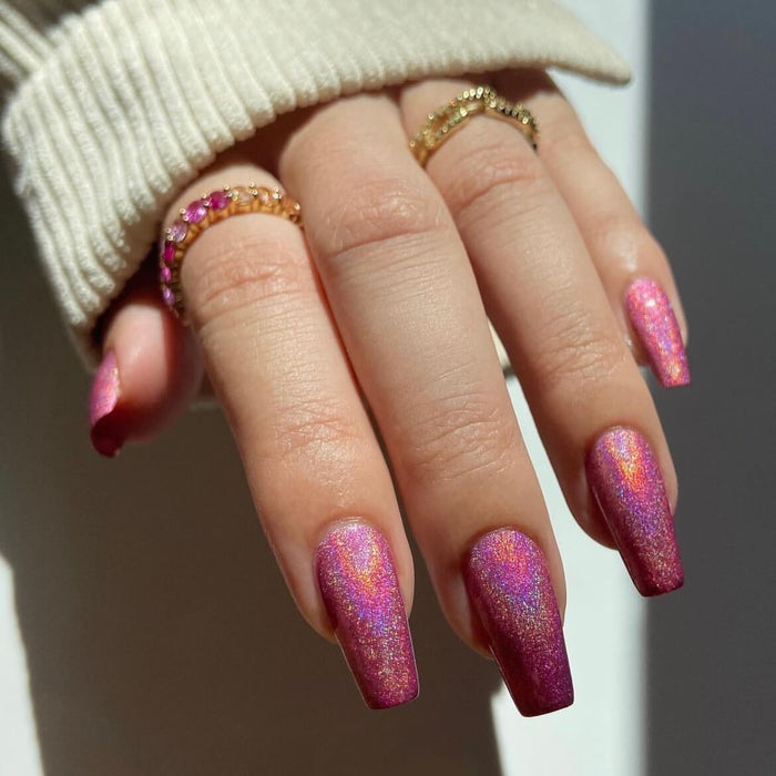 Shimmering Holographic Pink Gel Nail Wraps for a glamorous and glittery manicure.