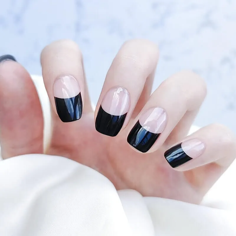 Black French Gel Nail Wraps featuring classic black tips on a nude base for an elegant and timeless French manicure look.