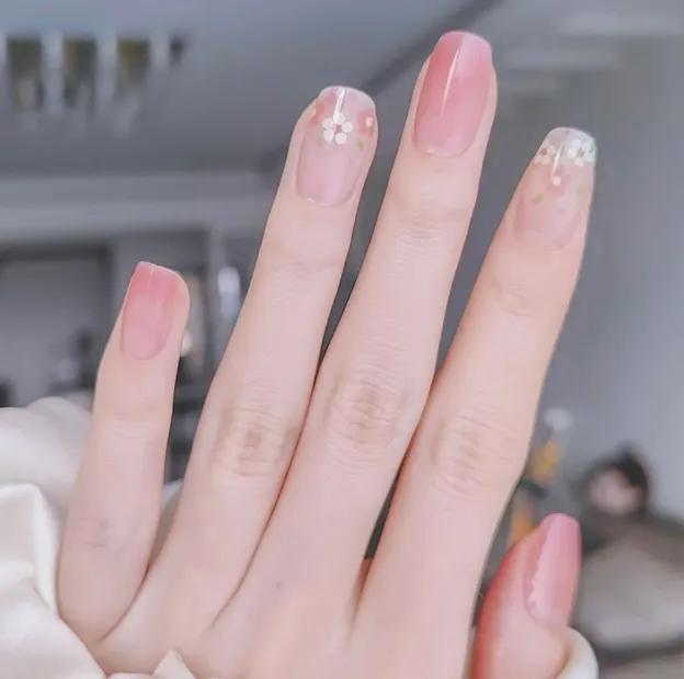 Blossom Pink Daisy Gel Nail Wraps featuring soft pink hues and delicate floral daisy designs, ideal for a fresh and elegant manicure.