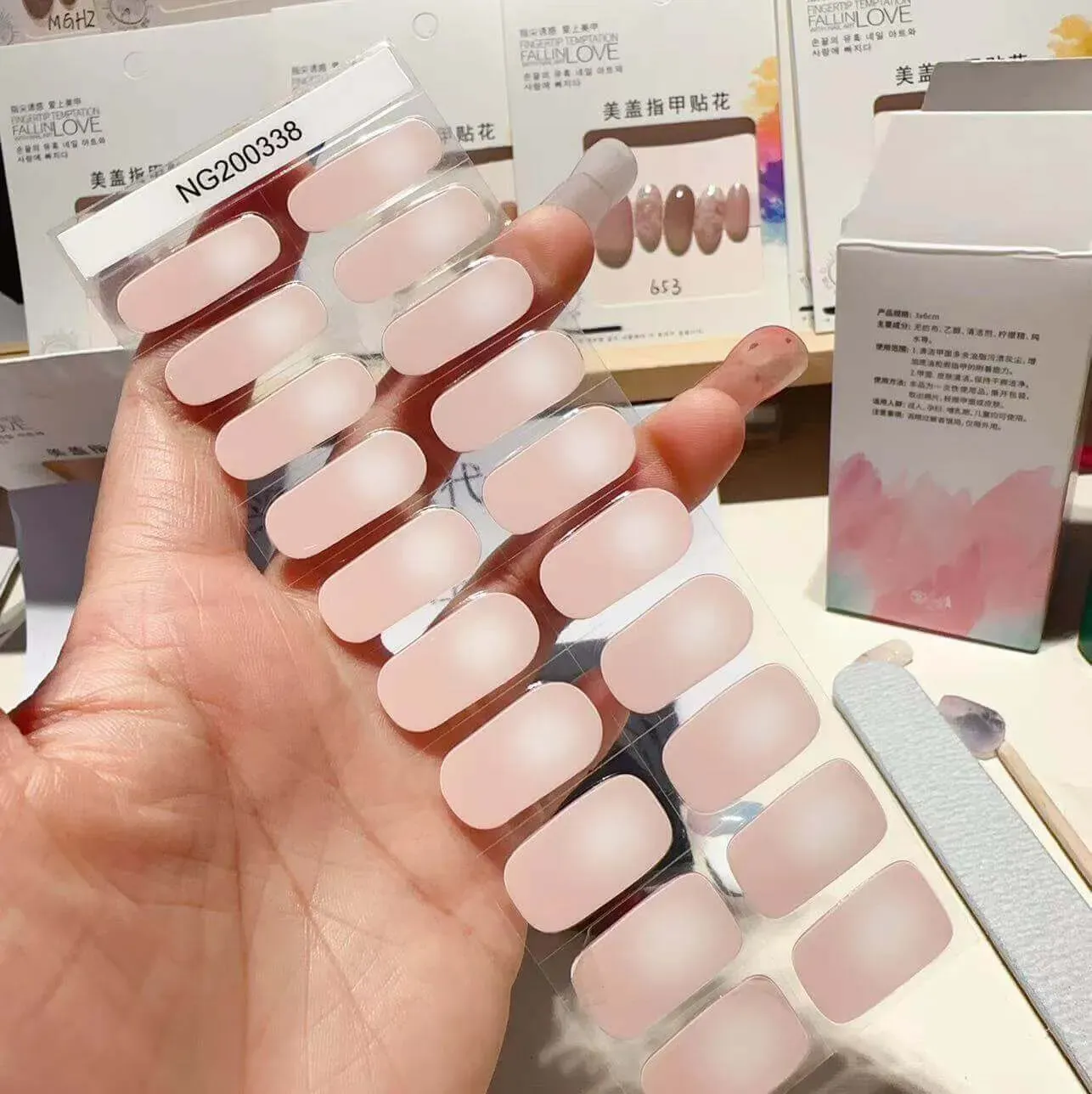 Blush Pearl Gel Nail Wraps with a soft pink pearl finish, offering a chic and timeless manicure at home.