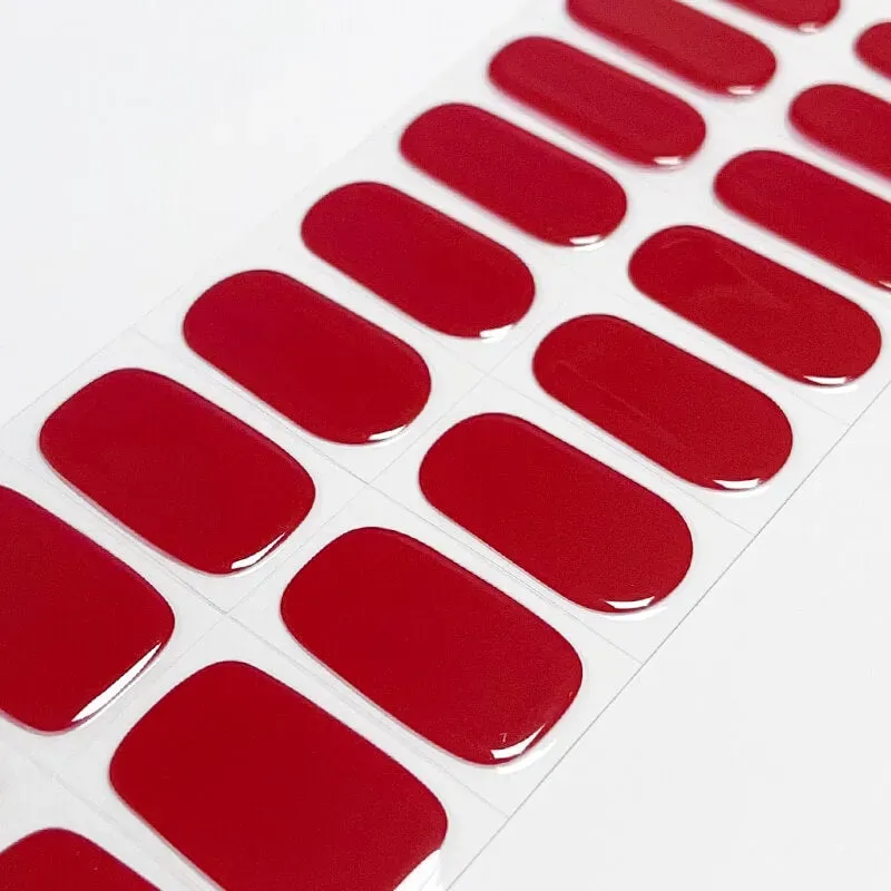 Classic Scarlet Gel Nail Wraps showcasing a vibrant red finish, perfect for bold and elegant manicures.