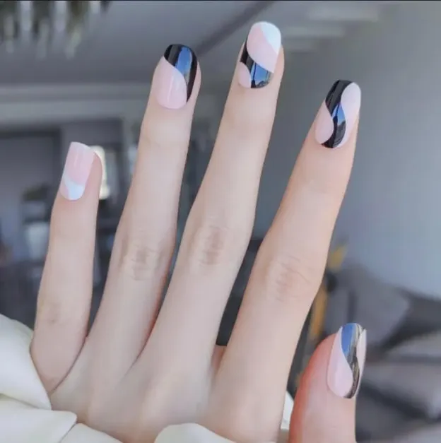Classy Monotone Elegance Gel Nail Wraps featuring abstract black-and-white designs for a chic and minimalist manicure.