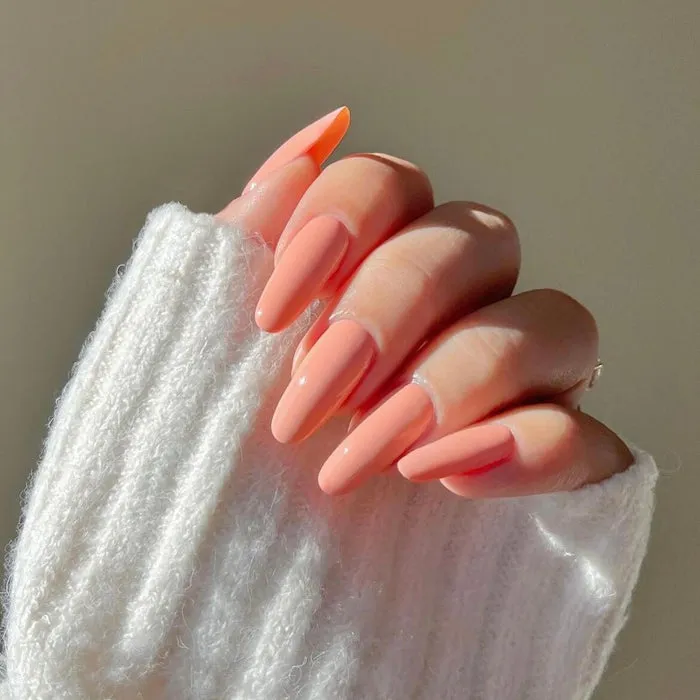 Coral Peach Gel Nail Wraps featuring a soft and elegant peach hue for a flawless manicure.